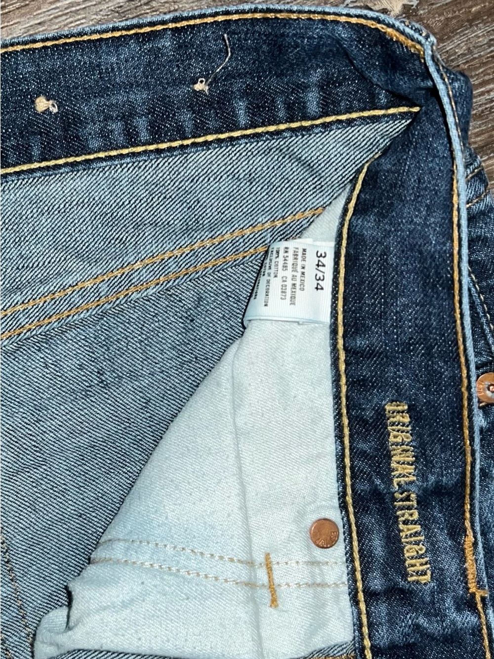 American Eagle Outfitters Men's Dark Blue Denim Jeans with Tan Stitching